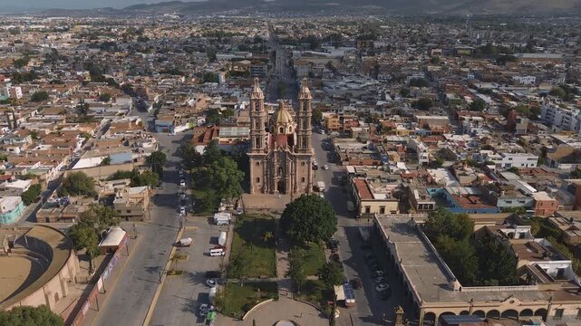 San luis potosi Aerial view of the church Parroquia Basilica Santuario de Nuestra Se&ntilde;ora de Guadalupe during sunset with the city in the background, beautiful religious catholic architecture