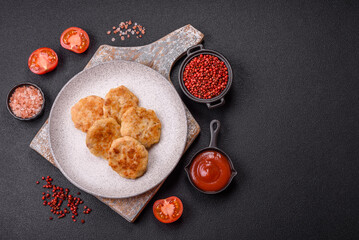 Delicious fresh fried minced fish cutlets with spices and herbs