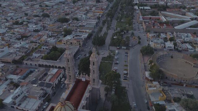 San luis potosi Aerial view of the church Parroquia Basilica Santuario de Nuestra Se&ntilde;ora de Guadalupe during sunset with the city in the background, beautiful religious catholic architecture