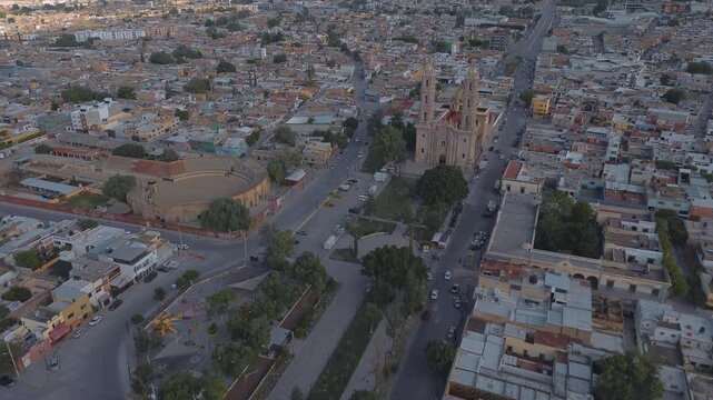 San luis potosi Aerial view of the church Parroquia Basilica Santuario de Nuestra Se&ntilde;ora de Guadalupe during sunset with the city in the background, beautiful religious catholic architecture