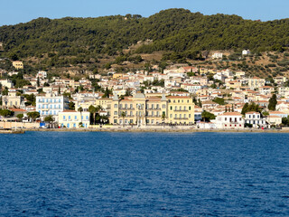 Fototapeta premium Spetses island, Greece. Seafront buildings view from the sea
