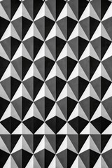 Black and white geometric triangle pattern.