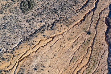 Aerial view of rivers and slopes near mine