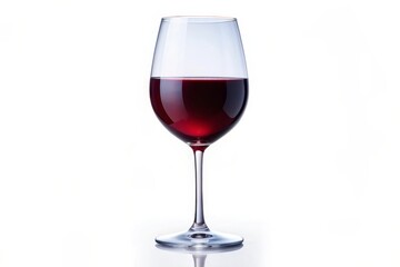 A single glass of red wine, filled to the brim, stands on a white surface. It symbolizes celebration, indulgence, relaxation, and the enjoyment of fine beverages.