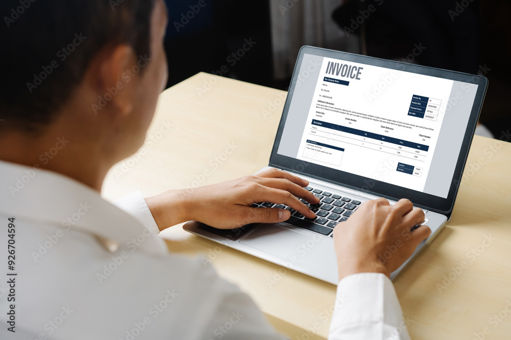 Poster invoice on computer screen from accounting application. computer program for financial and budget of
