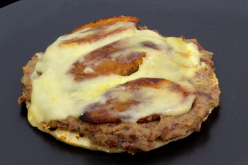 Arepa with cheese and fried sweet ripe plantains.