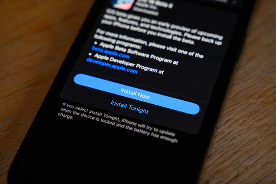 iPhone Screen with iOS 18 Beta 4 Update Prompt