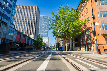 Broad street with tram tracks at downtown of Birmingham city. England