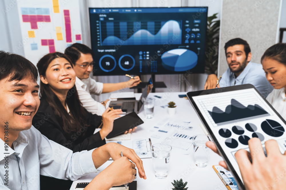 Fototapete analyst team uses bi fintech display tablet to analyze financial data . business people analyze bi s