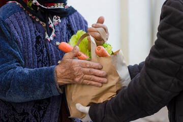 grocery delivery for old woman from supermarket. Health, shopping and female with elderly lady customer at home entrance, healthy food and groceries bag from retail store courier