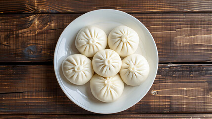 Delicious steamed buns on white plate, rustic table. Perfect for snack, lunch, dinner. Ideal for menus, food backgrounds