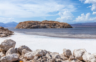 Lac Assal salt lake waters with islands in the middle, the lowest point of Africa, Tadjourah Region, Djibouti