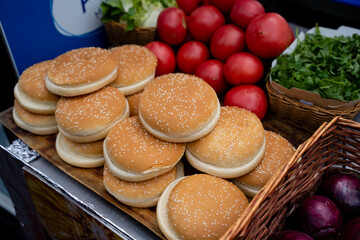 Enjoy Freshly Baked Sesame Burger Buns Combined with Fresh Produce Available at Your Local Market Today