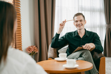 Psychological consultation gaining improvement on mental problem, happy young female patient doing therapy session while psychiatrist making diagnostic on mental illness. Unveiling