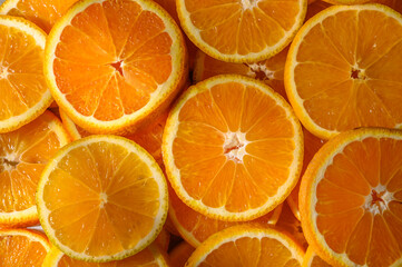 Flat lay composition with ripe sliced ​​oranges as background
