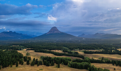 Canadian rocky Mountains nature background. Cloudy Summer sunrise