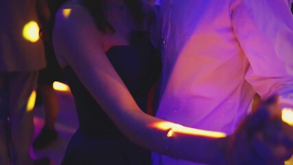 High school graduates dancing on prom, waltz and classical ball dance in dresses and suits on school graduation party, girls and boys classical ballroom dancers, couples dance quadrille and polonaise