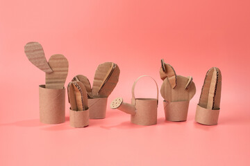 toy cactus and watering can