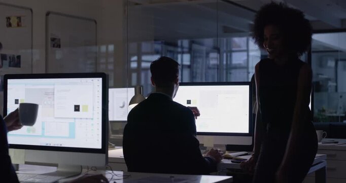 Computer screen, night and designer teamwork, manager advice or training of creative project at marketing agency. People planning, collaboration or mentor feedback on business software in dark office