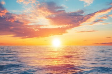 Obraz premium Serene summer sunset over the sea with golden sunlight reflecting on the water and soft clouds in the sky, creating a peaceful and tranquil atmosphere.