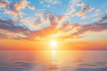 Obraz premium Serene summer sunset over the sea with golden sunlight reflecting on the water and soft clouds in the sky, creating a peaceful and tranquil atmosphere.
