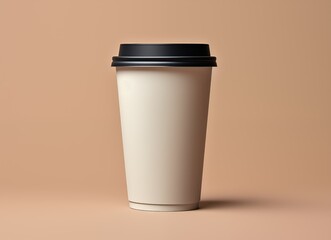  A white coffee cup placed on a soft beige background, creating a warm and inviting atmosphere.