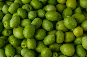 Background of olives. Background with green olives. Olives. Olive