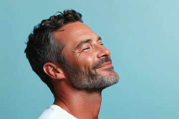 Fototapeta premium A close up of a man's face with her eyes closed