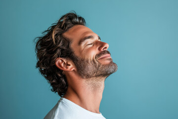 Obraz premium A close up of a man's face with her eyes closed