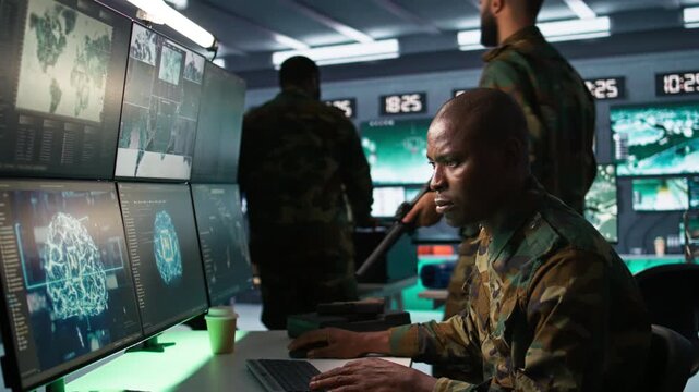 Army software developer employing AI tech in military planning and decision making. African american IT specialist uses artificial intelligence to enhance combat operational capabilities, camera B