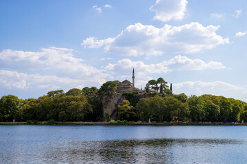 The waterfront of Pamvotida lake in Ioannina, Greece, with the predominant old castle of Ali Pasha in view