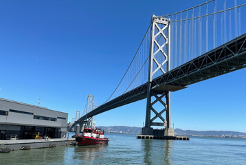 San Francisco Bay Bridge with fireboat