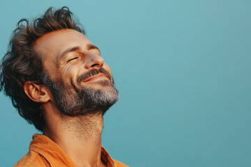 A close up of a man's face with her eyes closed