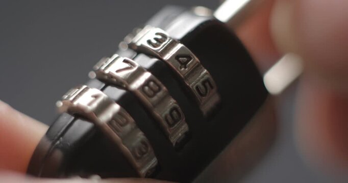 Padlock macro opening and closing studio shot