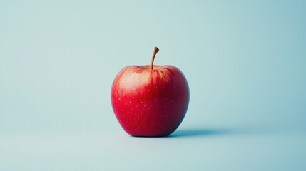 Red Apple on a Blue Background