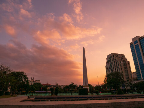 Silhouette independence myanmar monument city center on sunset. Golden time sunset sky freedom sacred worship. famous travel destinations in Myanmar Culture. Monument Place of Worship spiritual Place