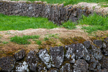 Reykjavik Iceland, lava rock wall or fence  around animal enclosure