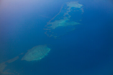 Aerial view over coral reef, Fiji