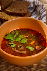Hearty Beef Kharcho Soup with Spices, Rice, and Fresh Herbs