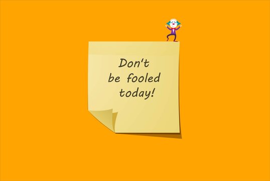 A yellow sticky note with the handwritten text "Don't be fooled today!" on a bright orange background. A small clown figure is balancing on the edge of the sticky note. Humorous and playful.