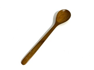 A single wooden spoon for eating isolated on white background