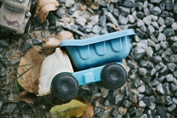 Abandoned old truck toy on the ground