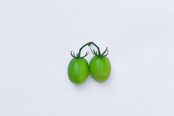 Green tomatoes on isolated white background
