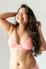 Fototapeta premium Professional Portrait of Curvy Woman in Pink Bikini