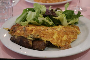 French cuisine: omelette and salad in Toulouse, France