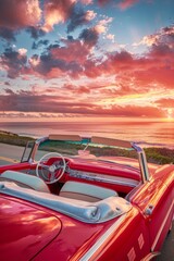 Vintage Red Convertible Car on Scenic Coastal Road During Vibrant Sunset