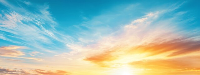 Obraz premium The sun sets over the ocean, painting a blue backdrop dotted with wispy clouds A solitary boat anchors the scene in the foreground