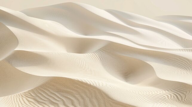 The image shows a close-up view of white sand dunes in a desert landscape. The dunes are rippled and textured, with the light of the sun reflecting off their surface. The vastness of the desert can be
