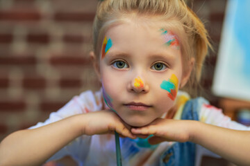 thoughtful painter girl