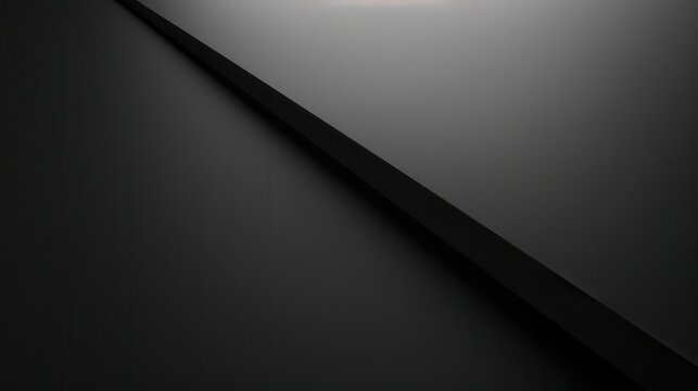 A minimalist background featuring a diagonal black line intersecting with a lighter grey surface. The light source is positioned above the line, casting a subtle shadow on the grey surface. The image 